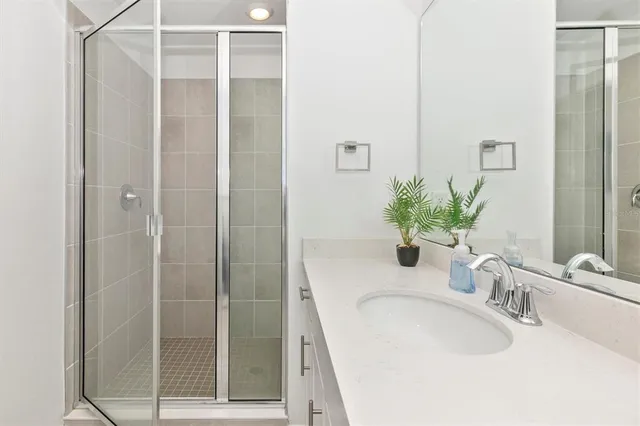 a view of a golf course with an ocean