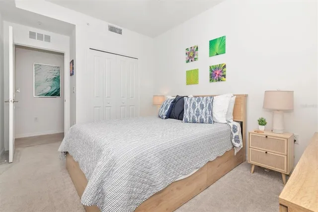 a building outdoor space with patio furniture and potted plants