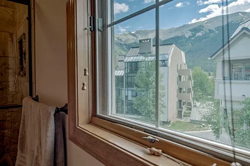 a bedroom with a bed and a closet