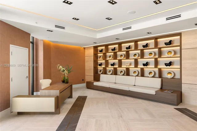 a spacious bedroom with a bed and a couch