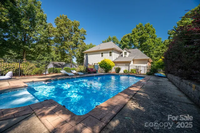 a view of a house with swimming pool