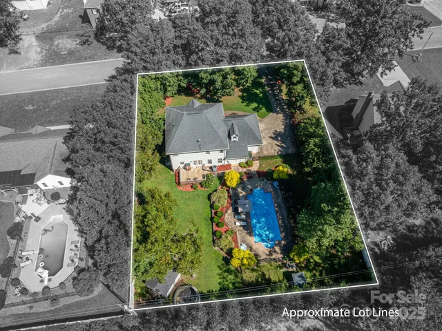 an aerial view of residential house with outdoor space
