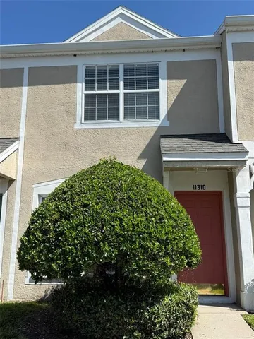 a house view with a garden space