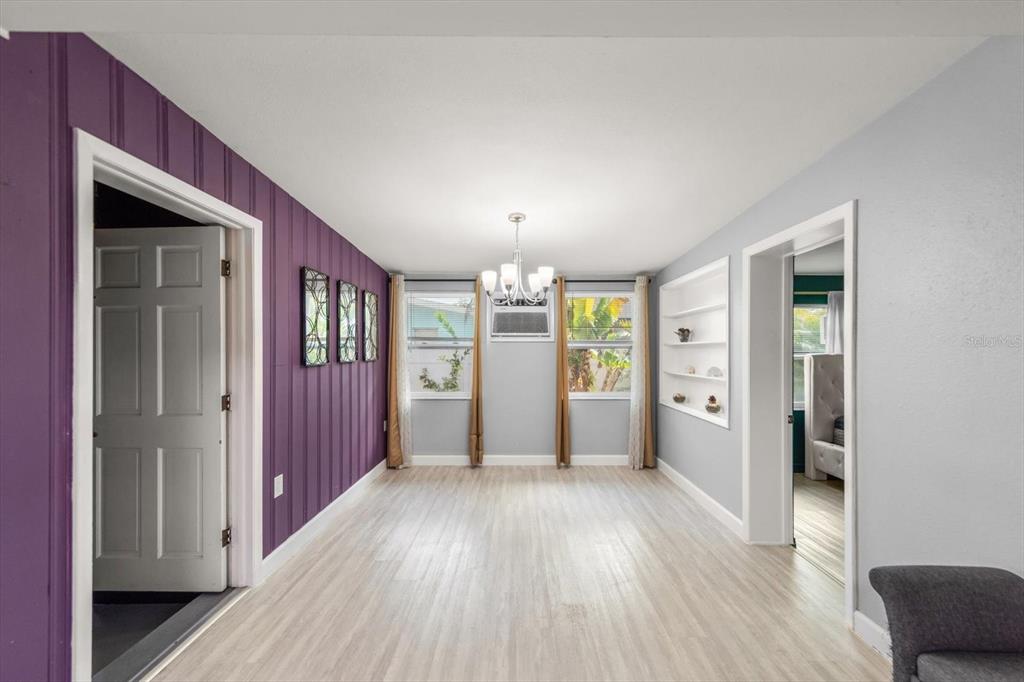 611 11th Street Northwest Largo, FL 33770 - Photo 15 of 37 wooden floor in an empty room with a window