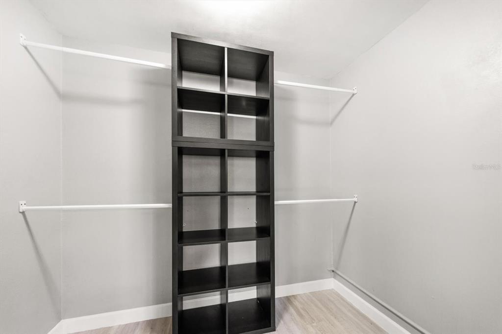 611 11th Street Northwest Largo, FL 33770 - Photo 18 of 37 a view of walk in closet with empty racks