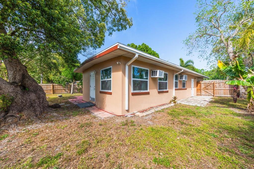 611 11th Street Northwest Largo, FL 33770 - Photo 29 of 37 a view of a house with a yard