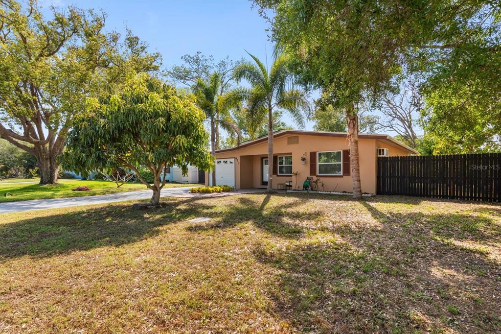 611 11th Street Northwest Largo, FL 33770 - Photo 37 of 37 a front view of a house with a yard