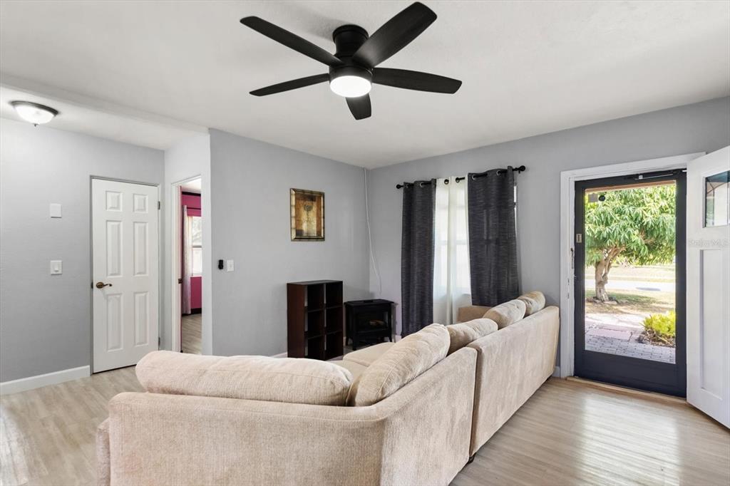 611 11th Street Northwest Largo, FL 33770 - Photo 7 of 37 a living room with furniture and a large window