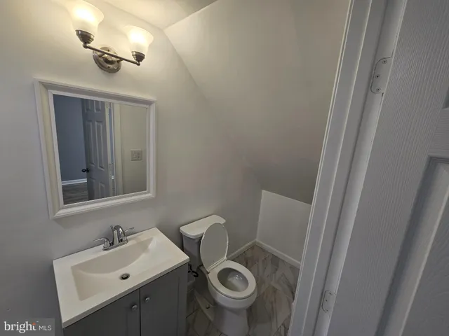 a bathroom with a sink and a toilet