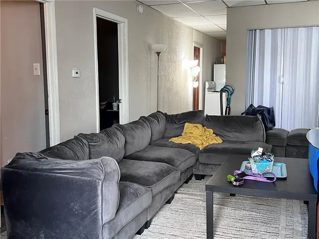 a living room with furniture and a couch
