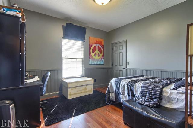6762 Alexander Road Heyworth, IL 61745 - Photo 20 of 27 a bedroom with a bed and a window