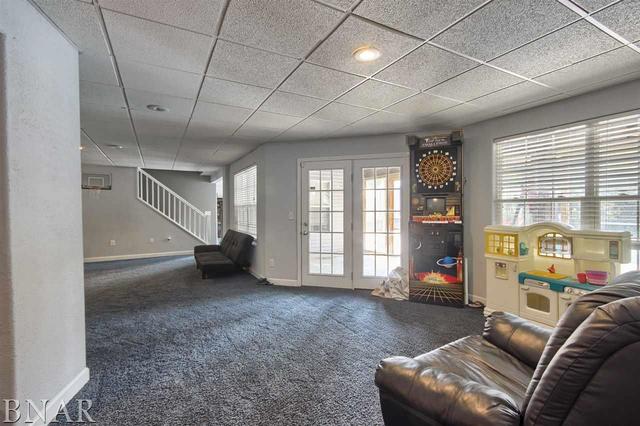 6762 Alexander Road Heyworth, IL 61745 - Photo 23 of 27 a living room with furniture and a window