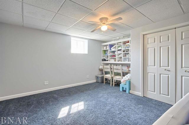 6762 Alexander Road Heyworth, IL 61745 - Photo 26 of 27 an empty room with windows and fan