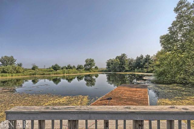 6762 Alexander Road Heyworth, IL 61745 - Photo 5 of 27 a view of a lake from a balcony