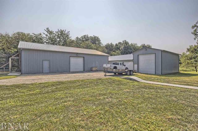 6762 Alexander Road Heyworth, IL 61745 - Photo 6 of 27 a house view with a backyard space