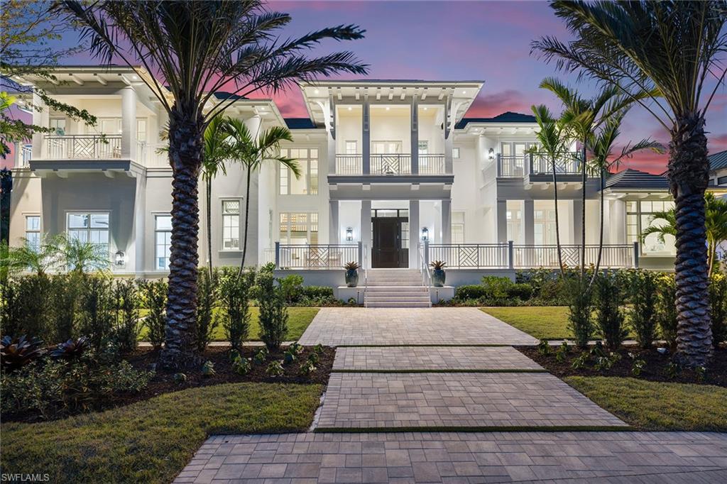 12 Sabre Lane Naples, FL 34102 - Photo 7 of 50 a view of a house with a yard