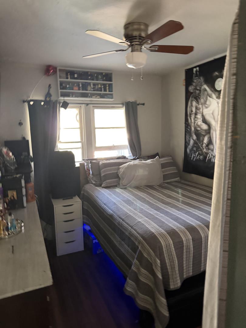 234 High Street Santa Cruz, CA 95060 - Photo 10 of 10 a bedroom with a bed and a window