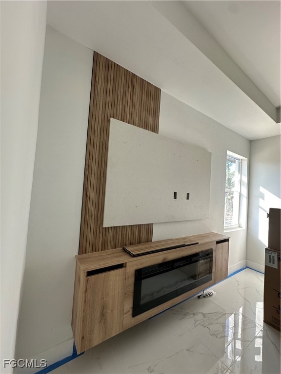 1073 Sherwin Street Port Charlotte, FL 33953 - Photo 2 of 14 a view of room with cabinets and wooden floor