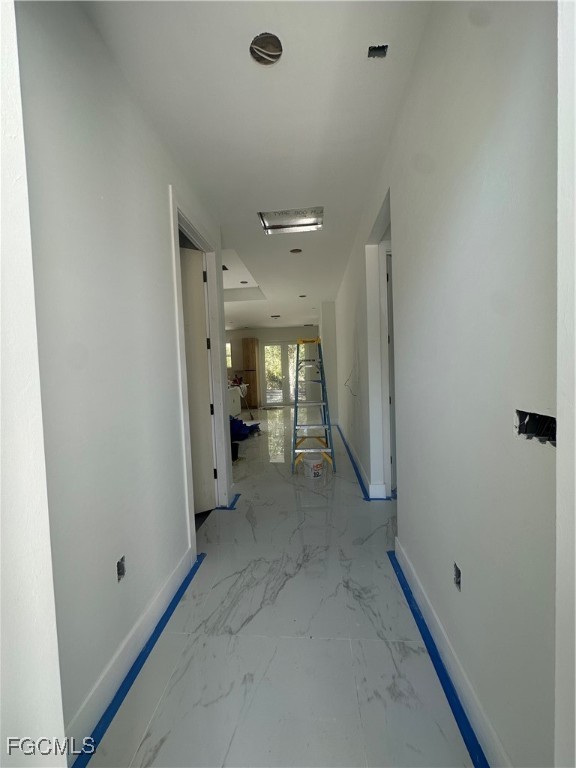 1073 Sherwin Street Port Charlotte, FL 33953 - Photo 7 of 14 a view of a big room with a hallway