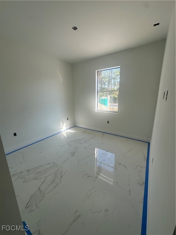 1073 Sherwin Street Port Charlotte, FL 33953 - Photo 8 of 14 a view of empty room with window