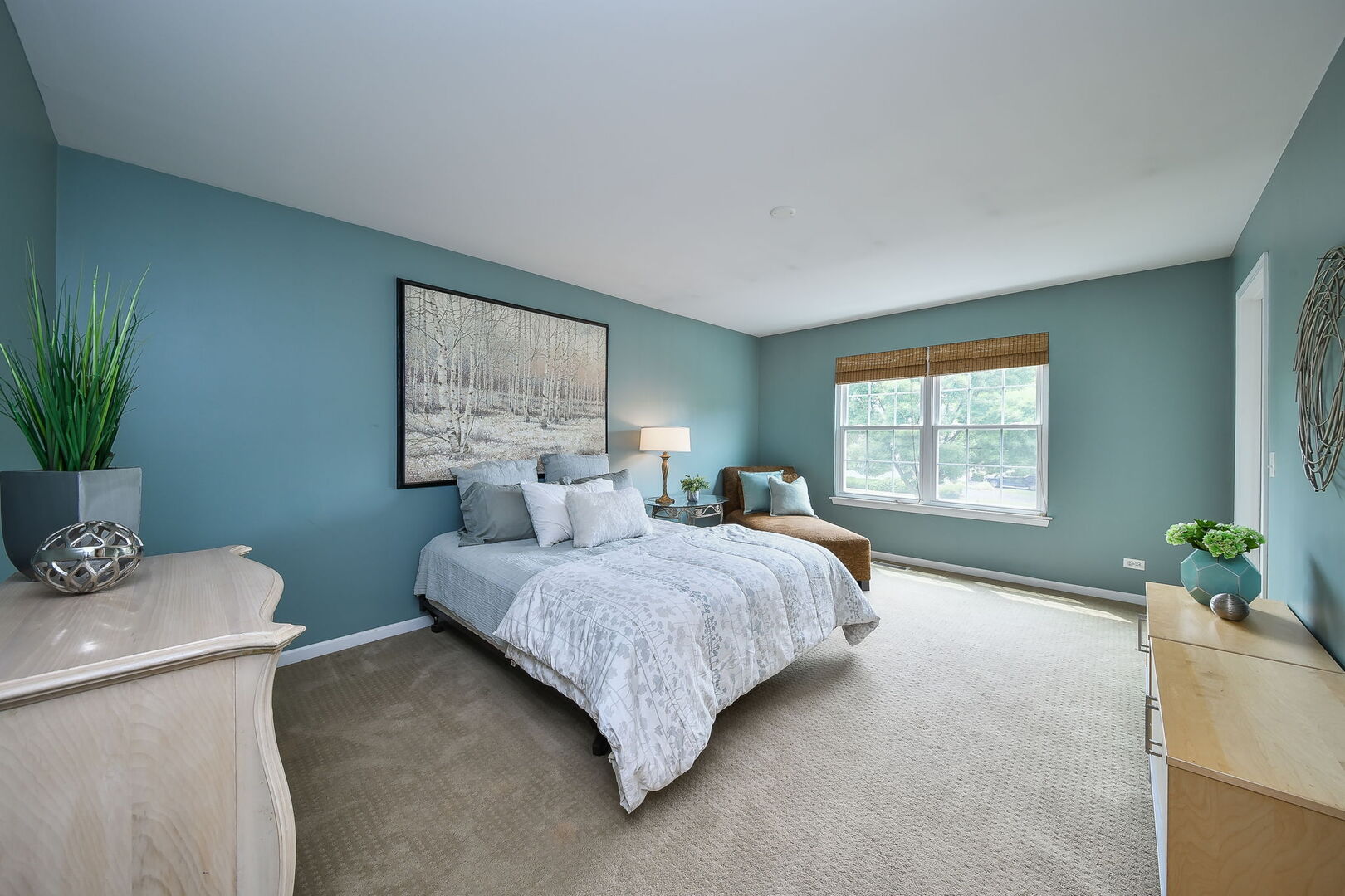 375 Ridge Road North Aurora, IL 60542 - Photo 15 of 24 a bedroom with a bed and a potted plant