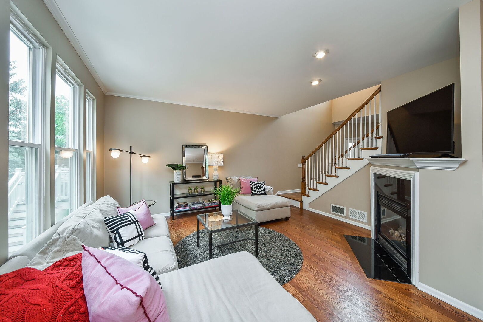 375 Ridge Road North Aurora, IL 60542 - Photo 4 of 24 a living room with furniture and a flat screen tv