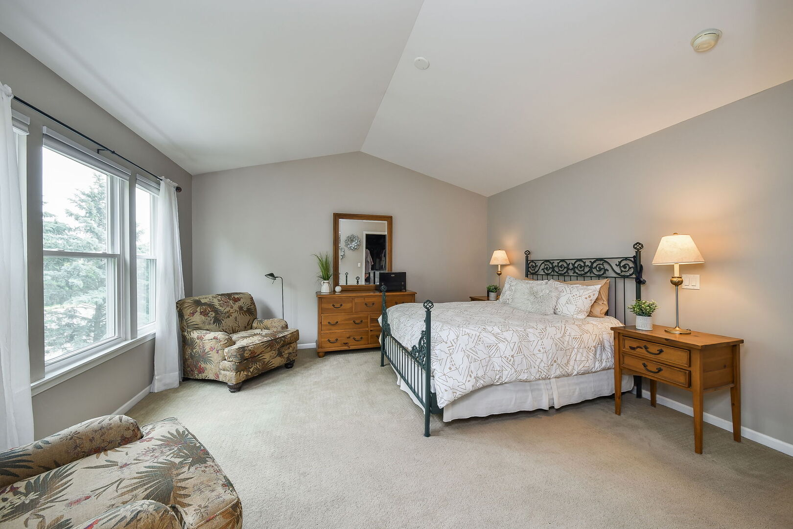 375 Ridge Road North Aurora, IL 60542 - Photo 10 of 24 a bedroom with a bed and a couch