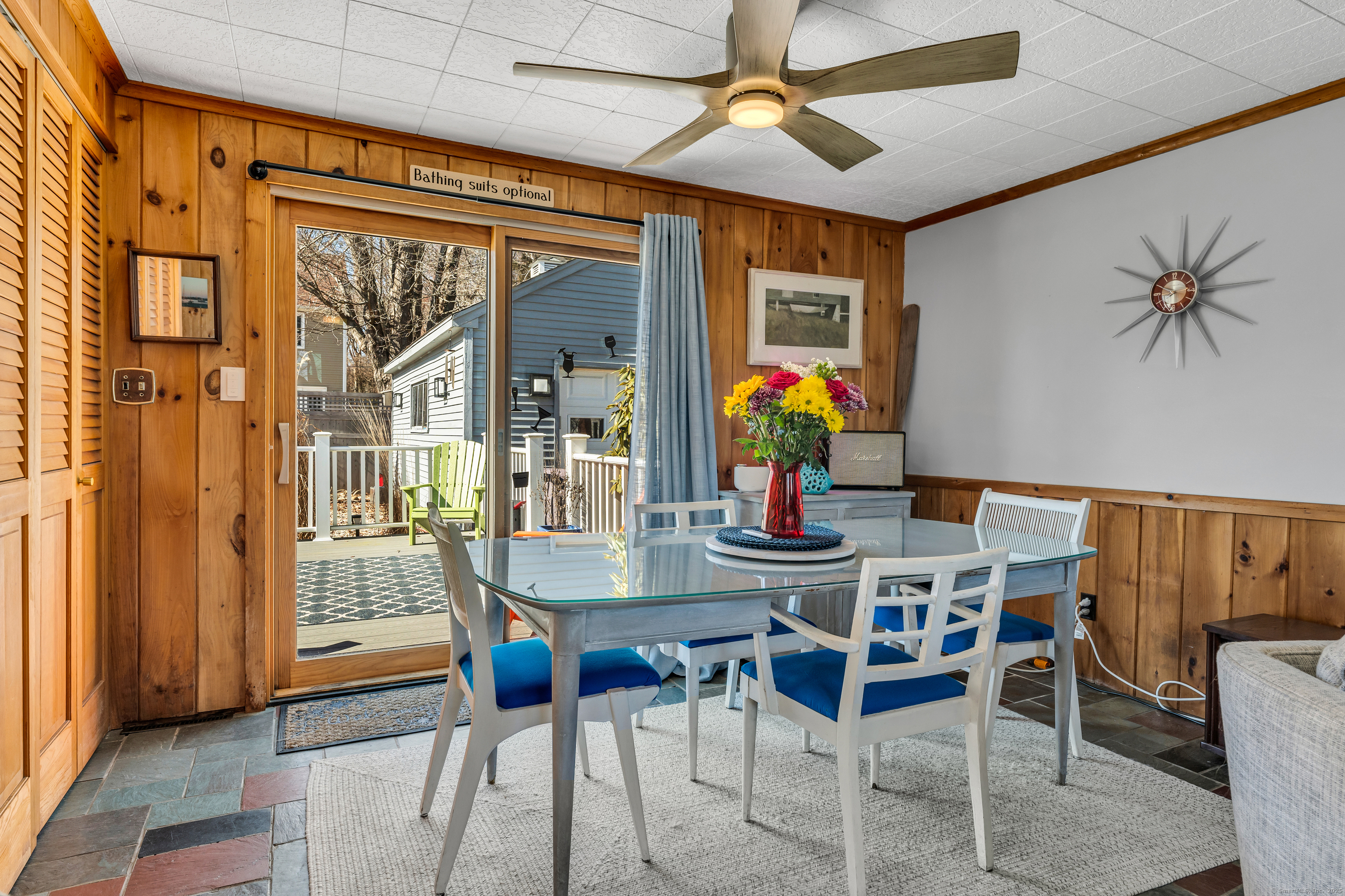 32 Bassett Lane Madison, CT 06443 - Photo 11 of 39 a dining room with furniture a chandelier and window