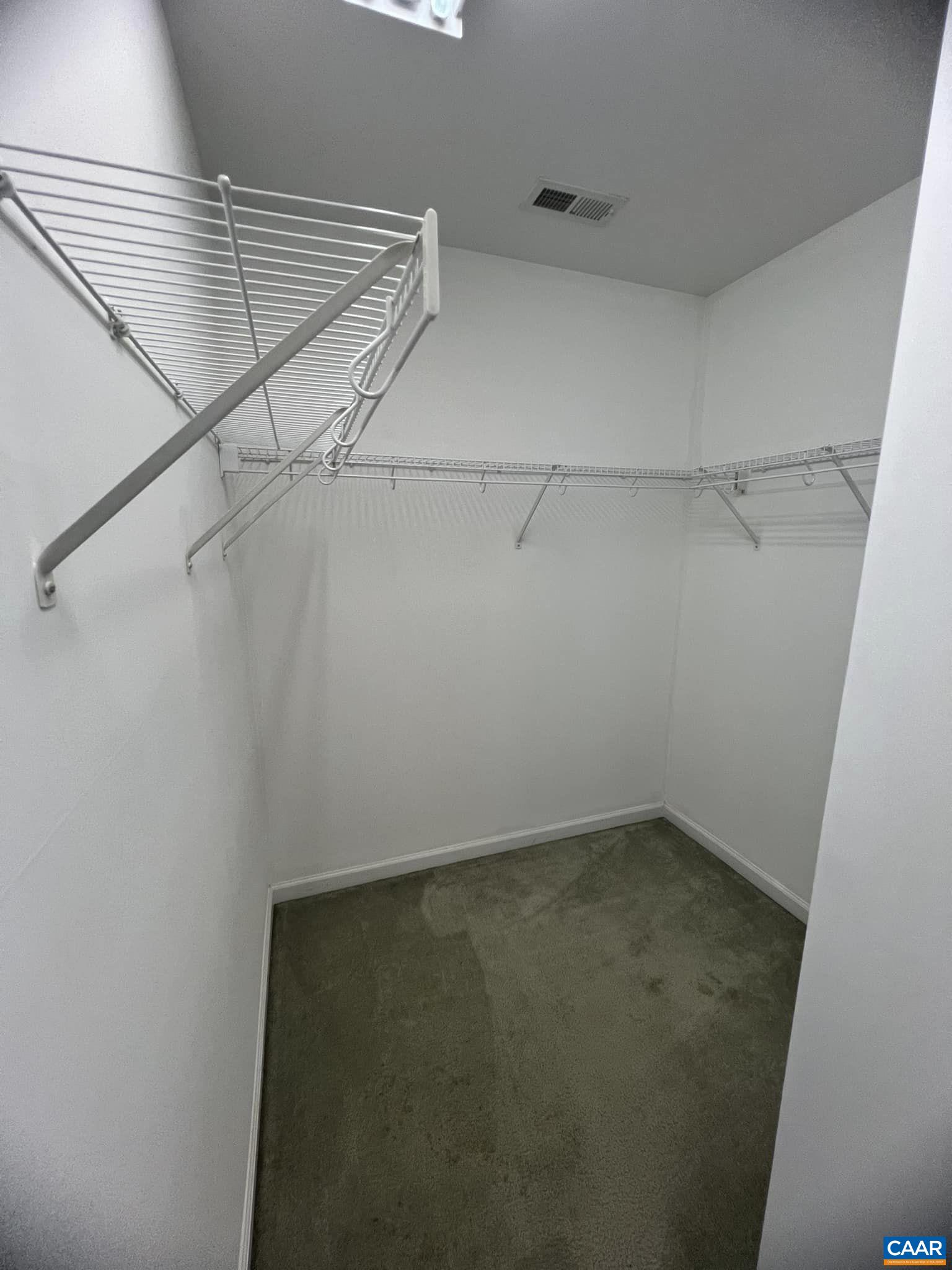 131 Burnet Street Charlottesville, VA 22902 - Photo 23 of 26 a view of a room with racks on the wall