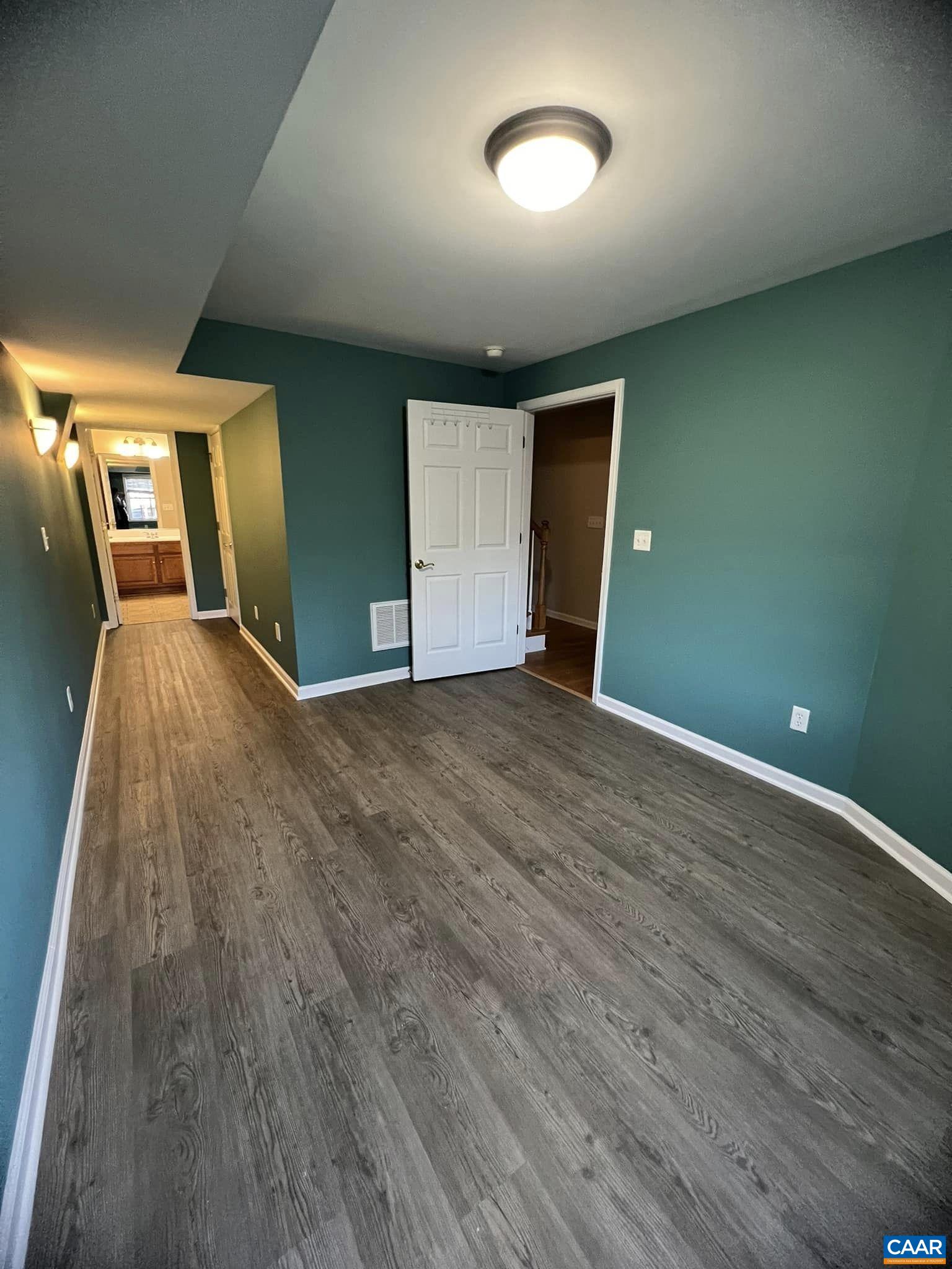 131 Burnet Street Charlottesville, VA 22902 - Photo 3 of 26 a view of a livingroom with wooden floor