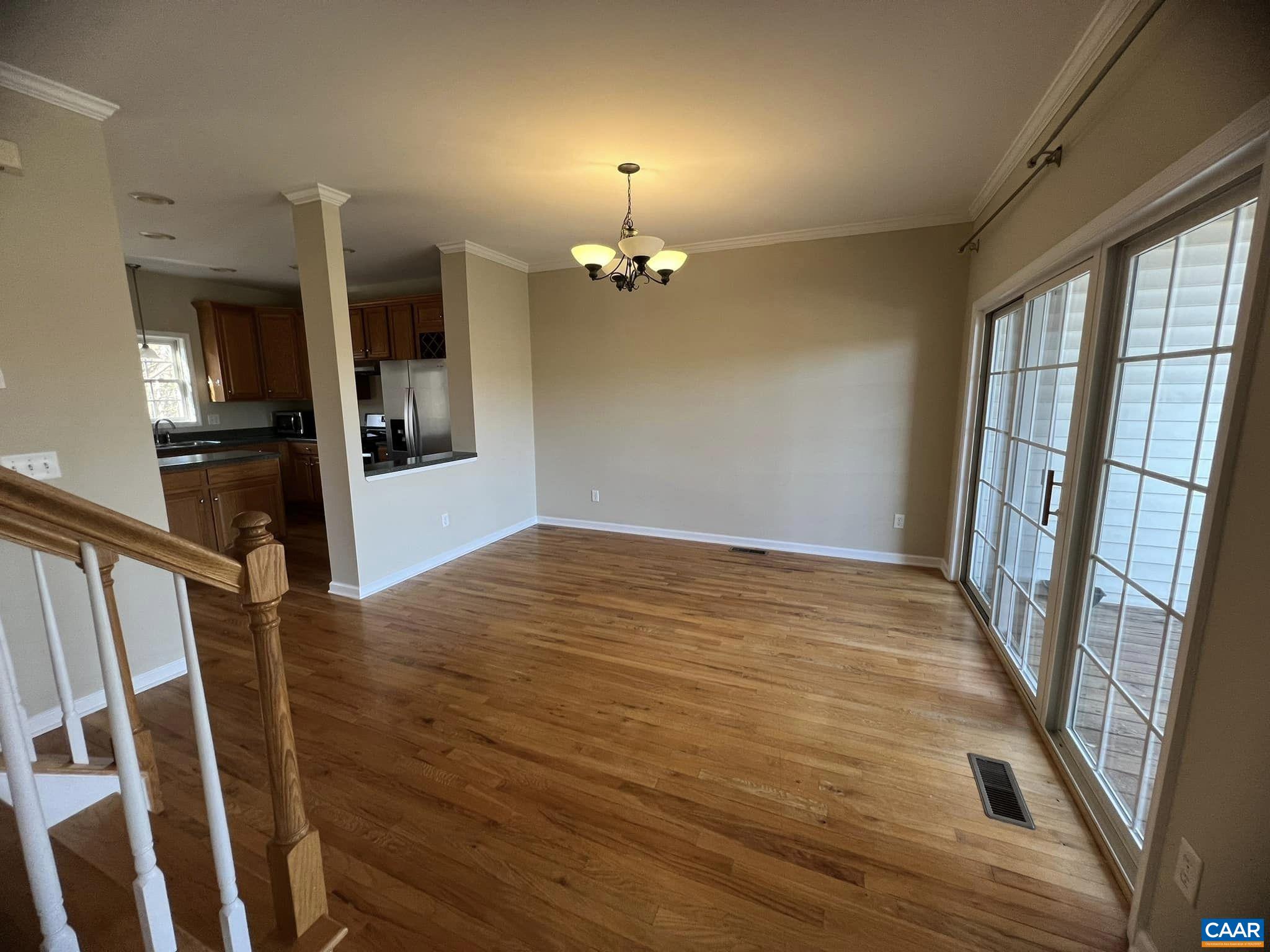 131 Burnet Street Charlottesville, VA 22902 - Photo 9 of 26 wooden floor in an empty room with a window