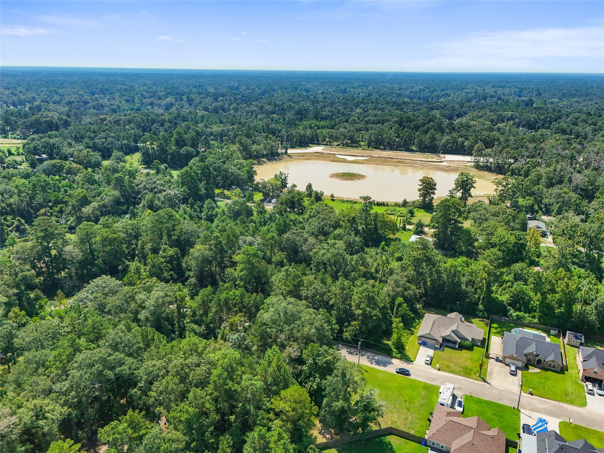 Tbd Tbd Lane Splendora, TX 77372 - Photo 8 of 10 an aerial view of residential houses with outdoor space and trees
