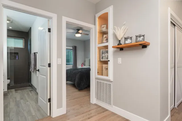 a view of a bedroom from the hallway