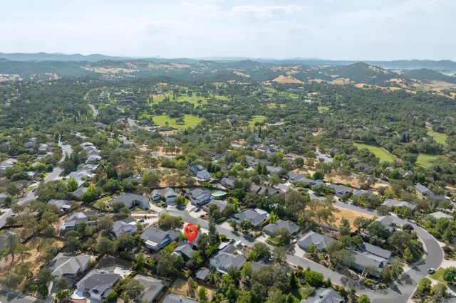 an aerial view of town with residential houses with city view