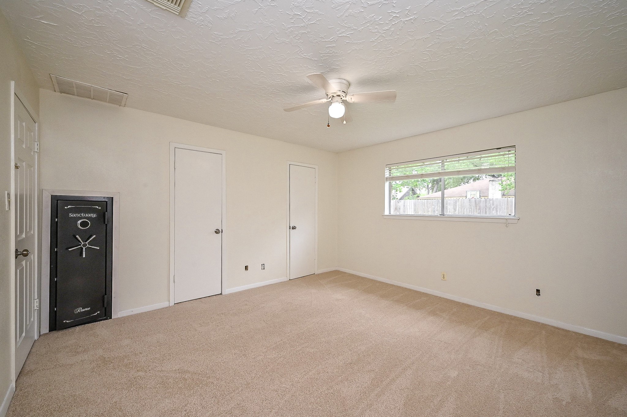 23814 Spring Gum Drive Spring, TX 77373 - Photo 16 of 21 a view of an empty room with a window