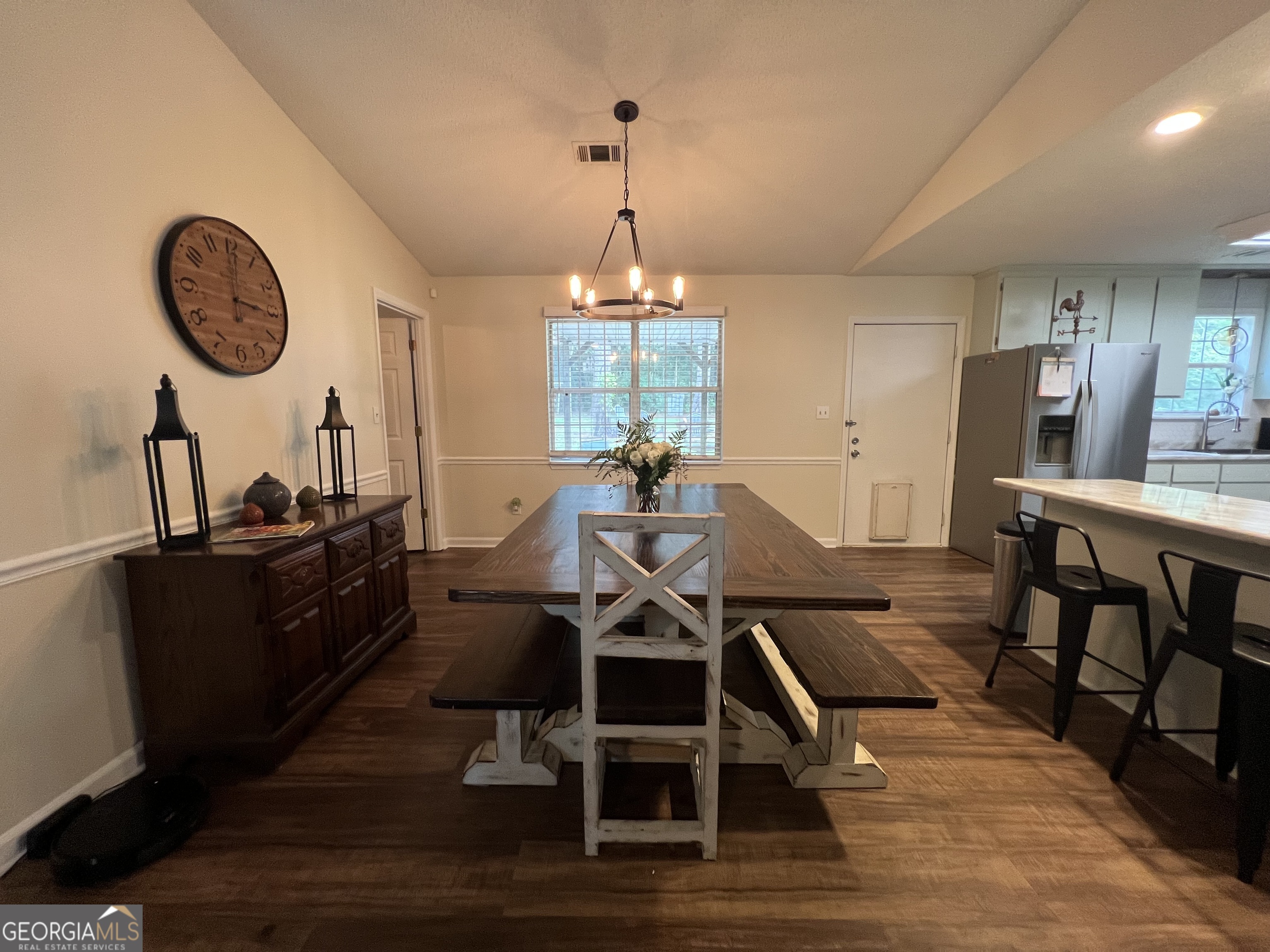 113 Camelot Drive Dublin, GA 31021 - Photo 11 of 45 a view of a dining room with furniture window and wooden floor