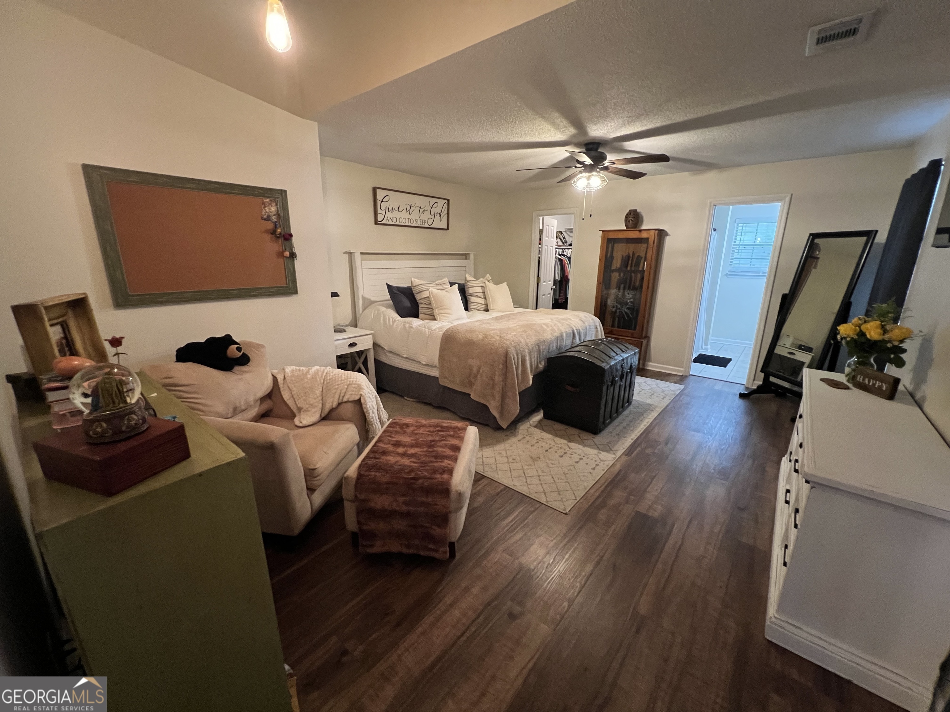 113 Camelot Drive Dublin, GA 31021 - Photo 26 of 45 a bedroom with furniture and a flat screen tv