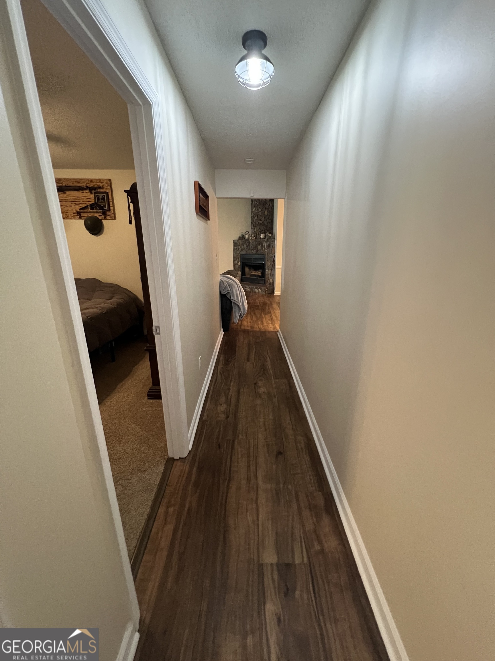 113 Camelot Drive Dublin, GA 31021 - Photo 37 of 45 a view of entryway and hall with wooden floor
