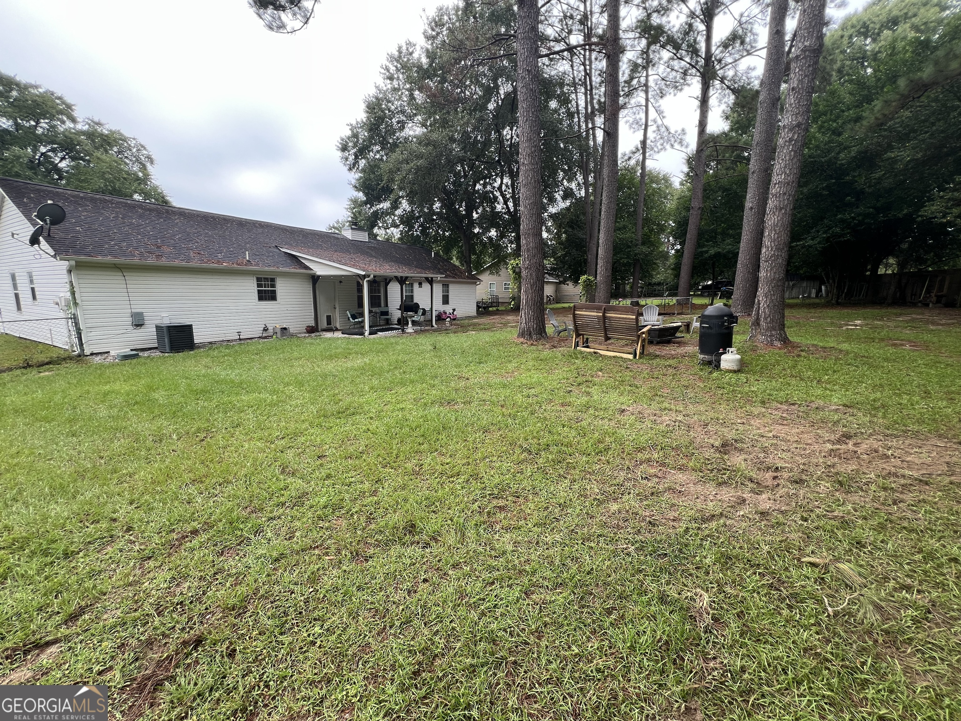 113 Camelot Drive Dublin, GA 31021 - Photo 44 of 45 a view of a house with backyard porch and sitting area