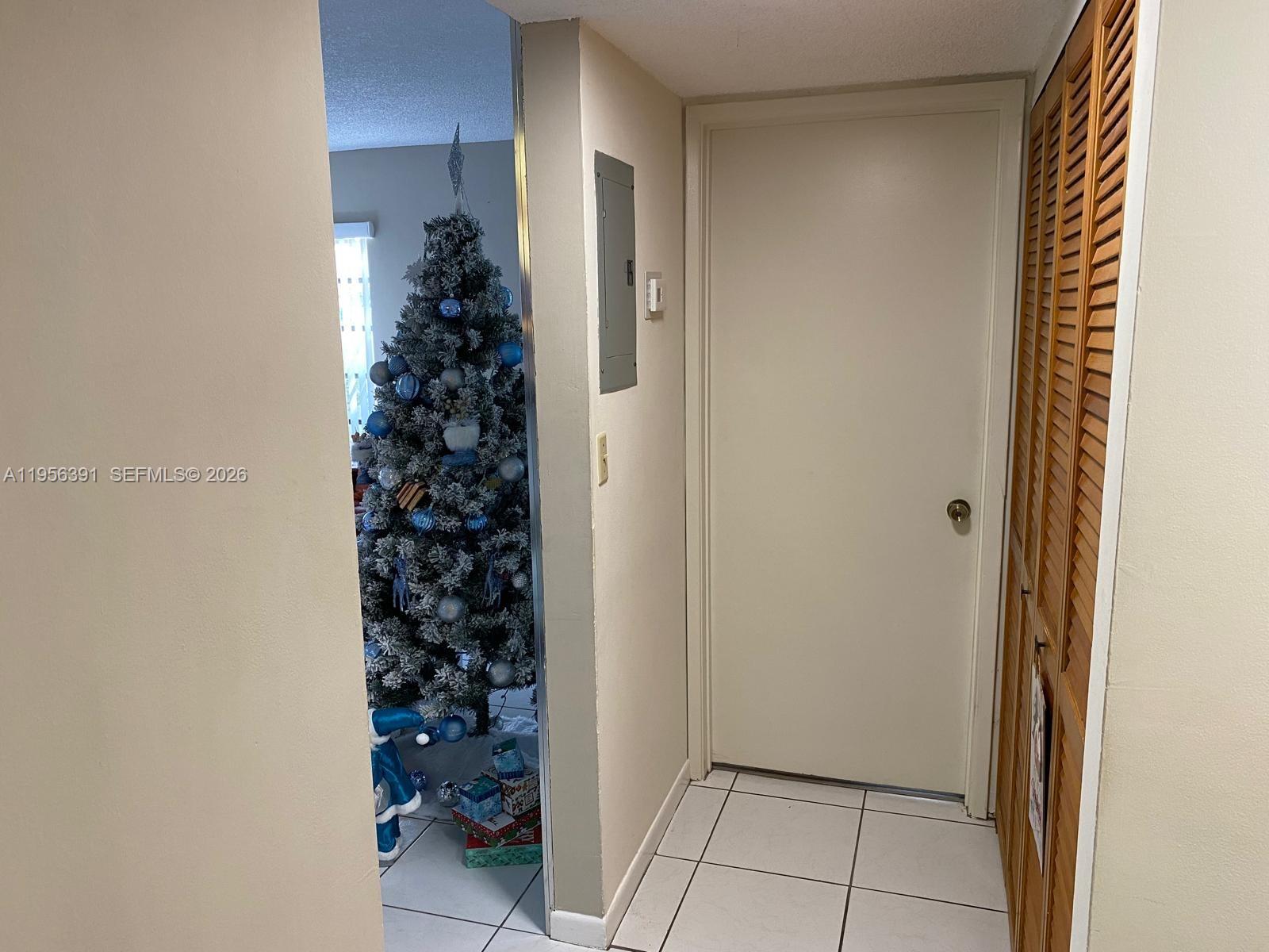 9070 Southwest 125th Avenue, Unit A101 Miami, FL 33186 - Photo 14 of 28 a view of entryway with window