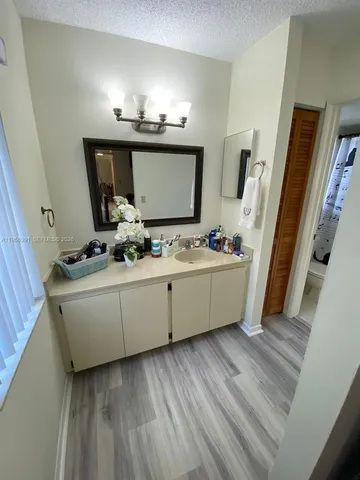 a bathroom with a toilet and shower