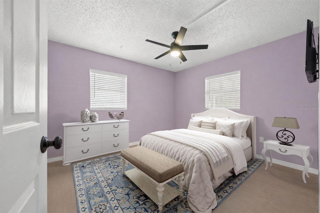 4489 Fishman Avenue Weeki Wachee, FL 34607 - Photo 14 of 29 a bedroom with a bed and a window