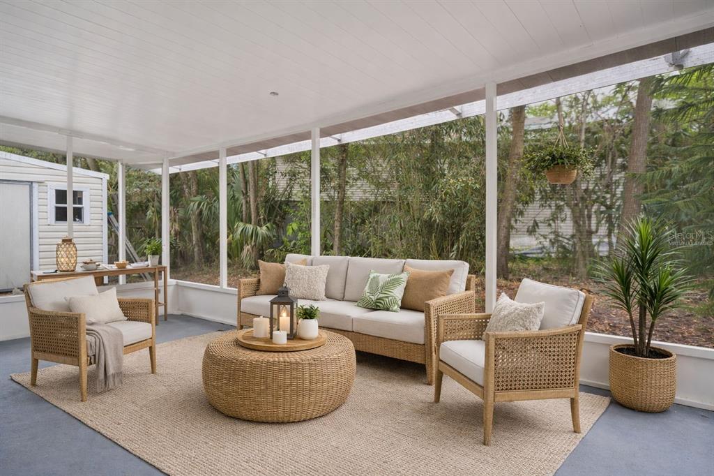 4489 Fishman Avenue Weeki Wachee, FL 34607 - Photo 15 of 29 a living room with furniture and a large window