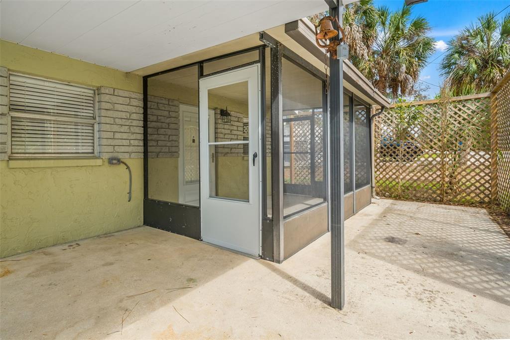 4489 Fishman Avenue Weeki Wachee, FL 34607 - Photo 6 of 29 a bedroom with a bed and a painting on the wall