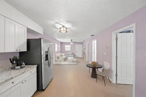 a bathroom with a double vanity sink toilet and shower