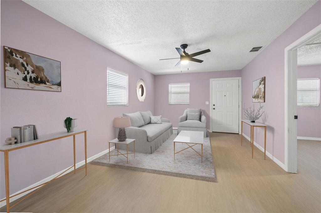 4489 Fishman Avenue Weeki Wachee, FL 34607 - Photo 10 of 29 a living room with furniture