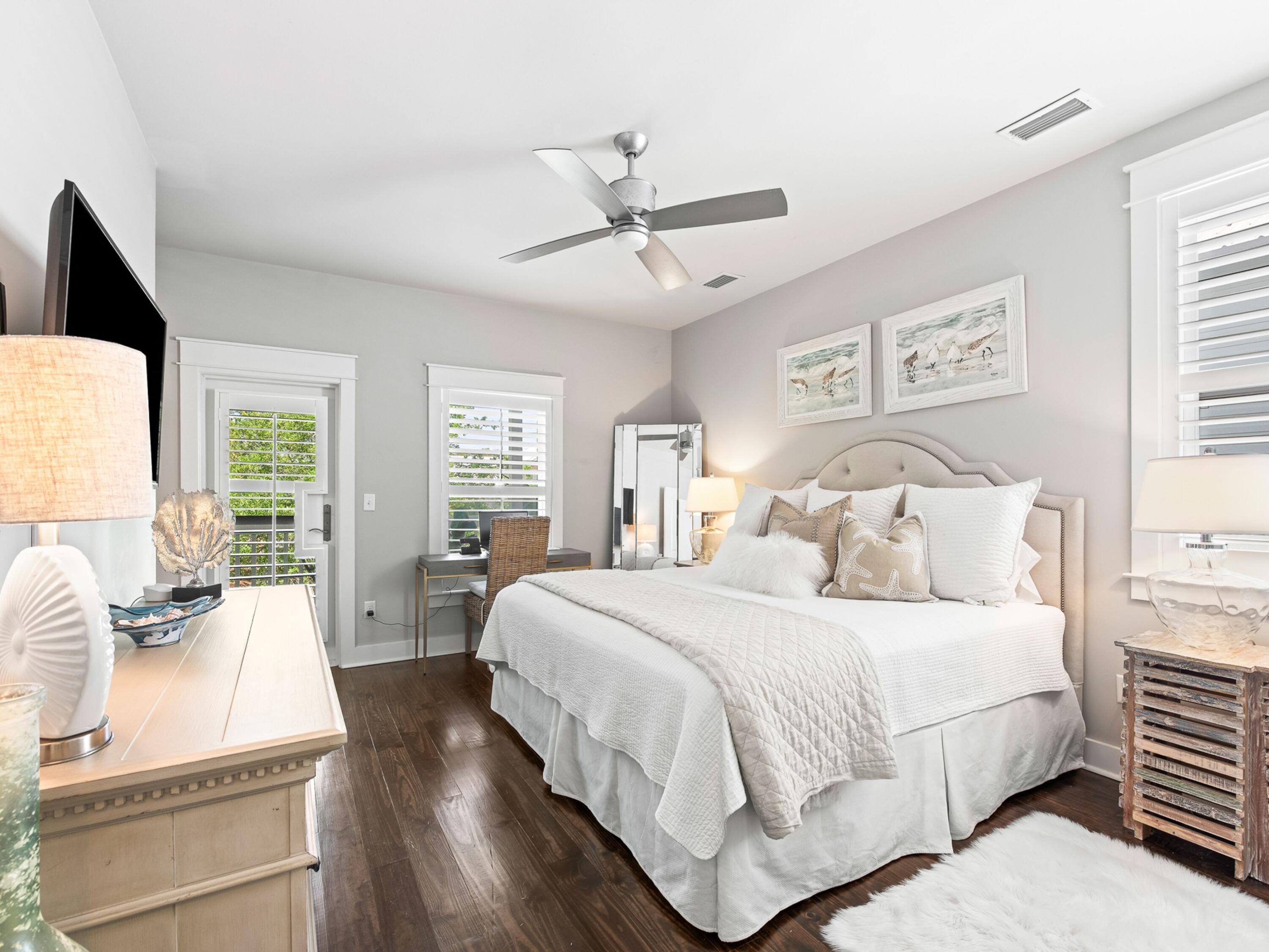 37 Dune Ridge Road Santa Rosa Beach, FL 32459 - Photo 22 of 40 a bedroom with a large bed and a window