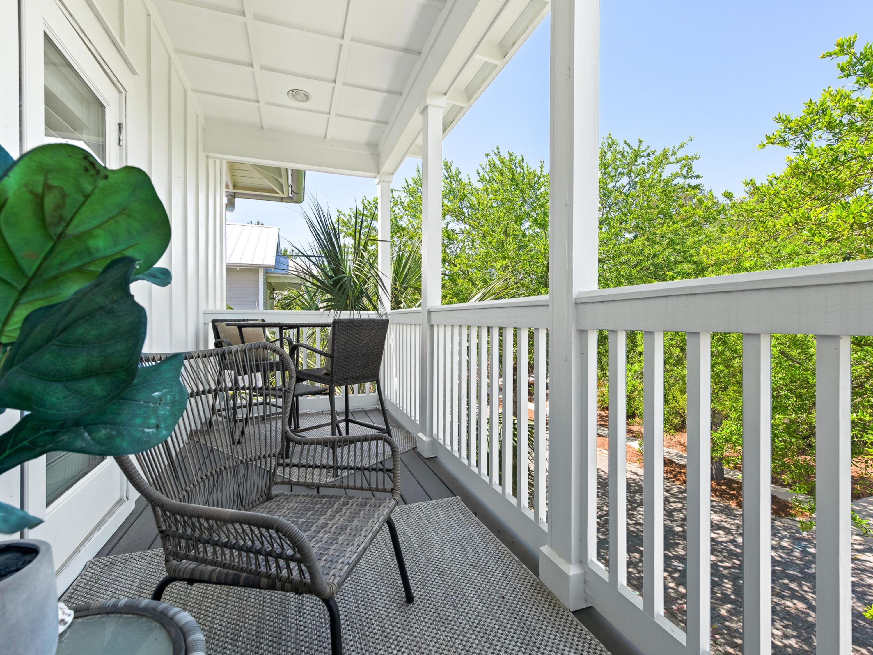 37 Dune Ridge Road Santa Rosa Beach, FL 32459 - Photo 25 of 40 a view of a chairs and table in patio