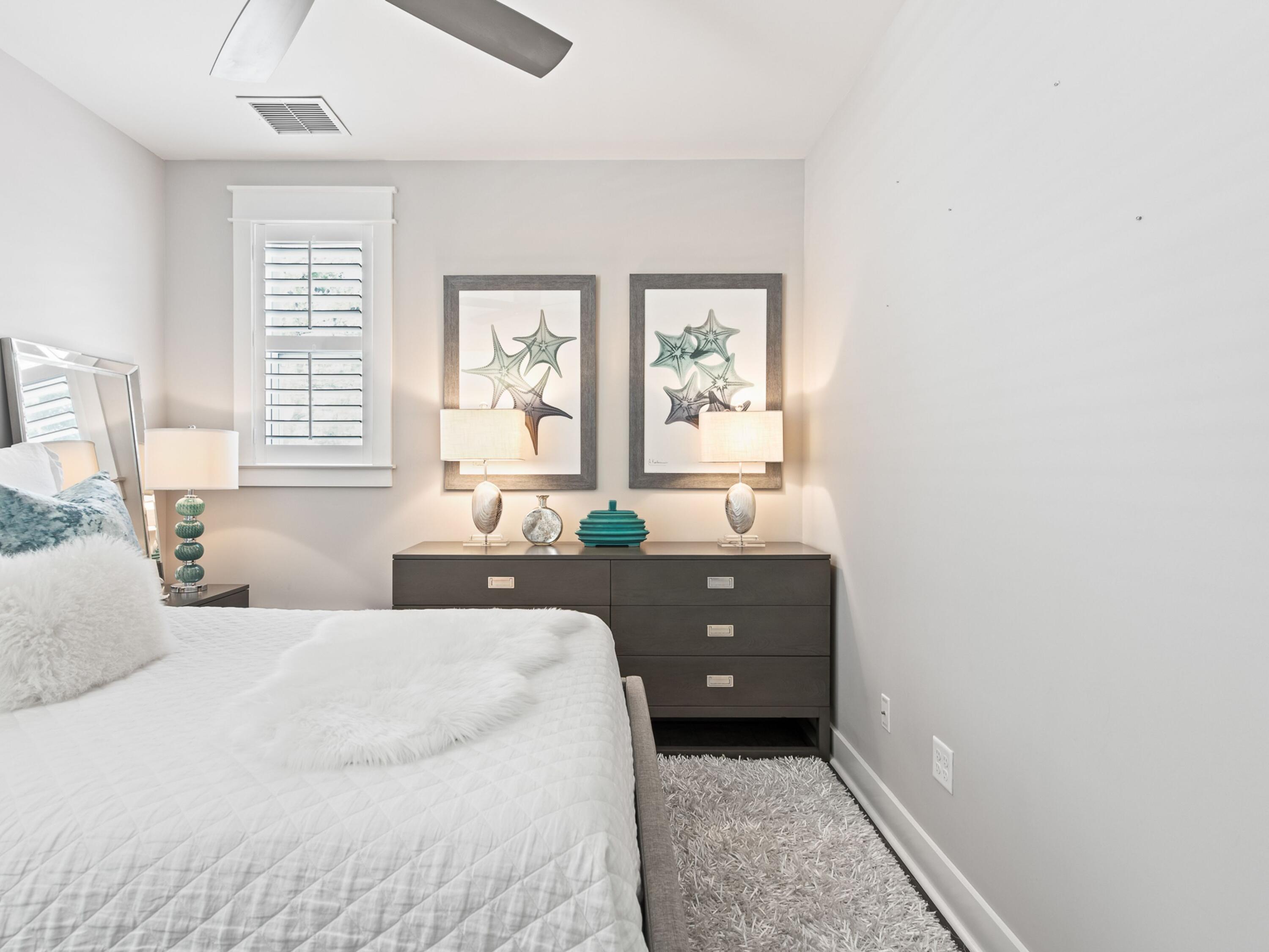 37 Dune Ridge Road Santa Rosa Beach, FL 32459 - Photo 27 of 40 a bedroom with a bed and window
