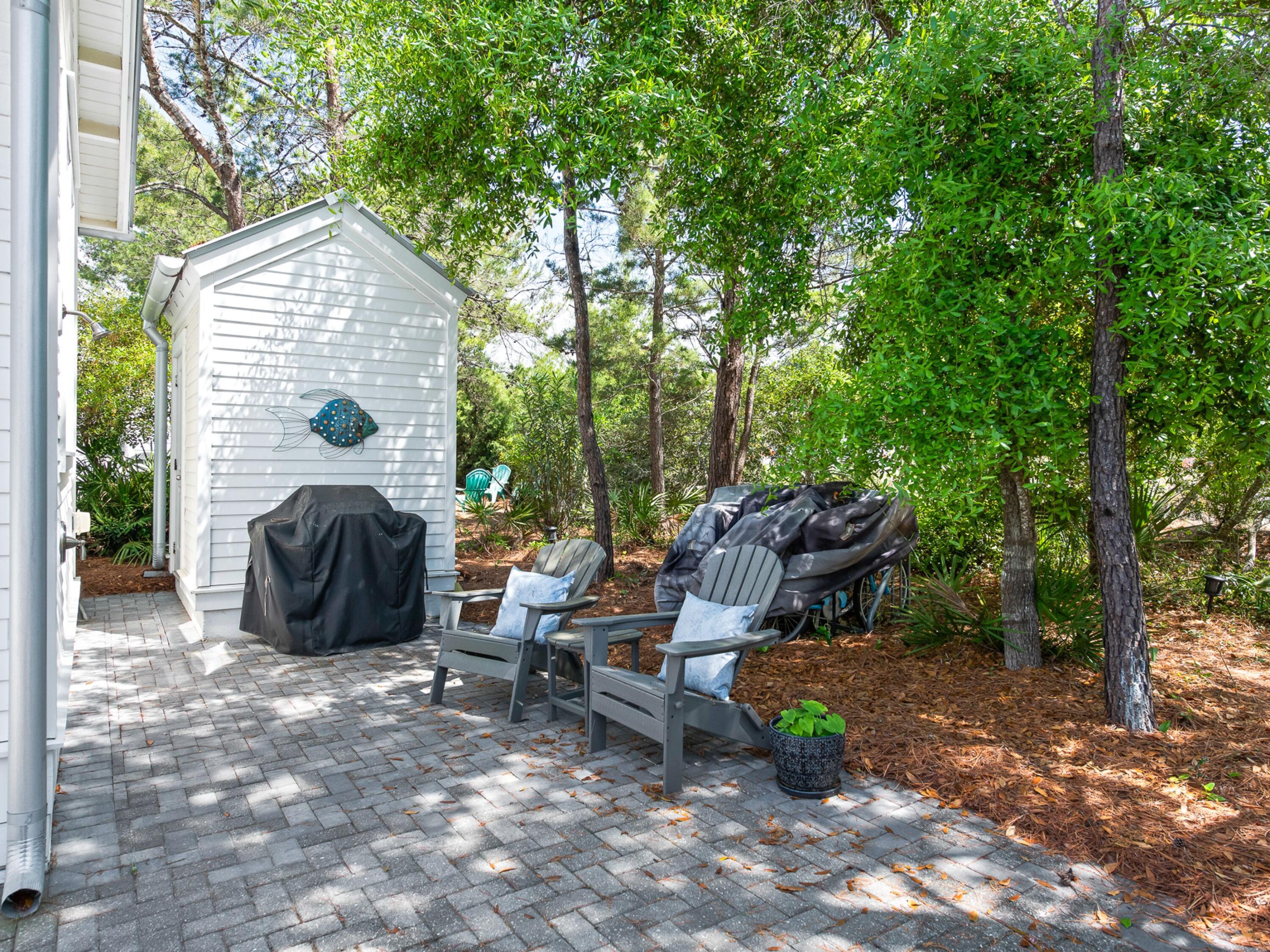 37 Dune Ridge Road Santa Rosa Beach, FL 32459 - Photo 32 of 40 a view of backyard with outdoor seating and trees